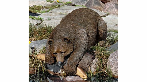 Artist Samuel Lightfoot brings this bear sculpture to life. (Image: Skymall.com)