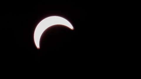 The view of a partial solar eclipse from the Spark Science Centre in Calgary, Alta., Monday, Aug. 21, 2017. (Jeff McIntosh/CP)