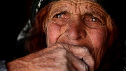 An elderly woman from the Qashqai tribe sits inside a tent in Eghlid in the southern Iranian province of Fars on July 8, 2008. Little has changed for the modern-day descendants of those who lived 2,500 years ago in what is now Iran. (ATTA KENARE/AFP/Getty Images)