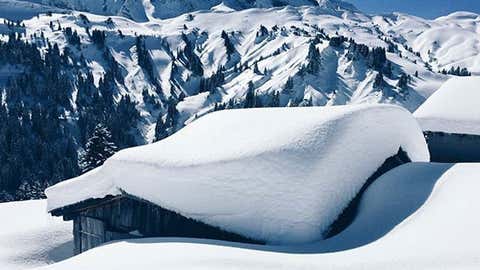 A snow-covered cabin at the Avoriaz resort in the French Alps in Morzine, France, on March 11, 2016.