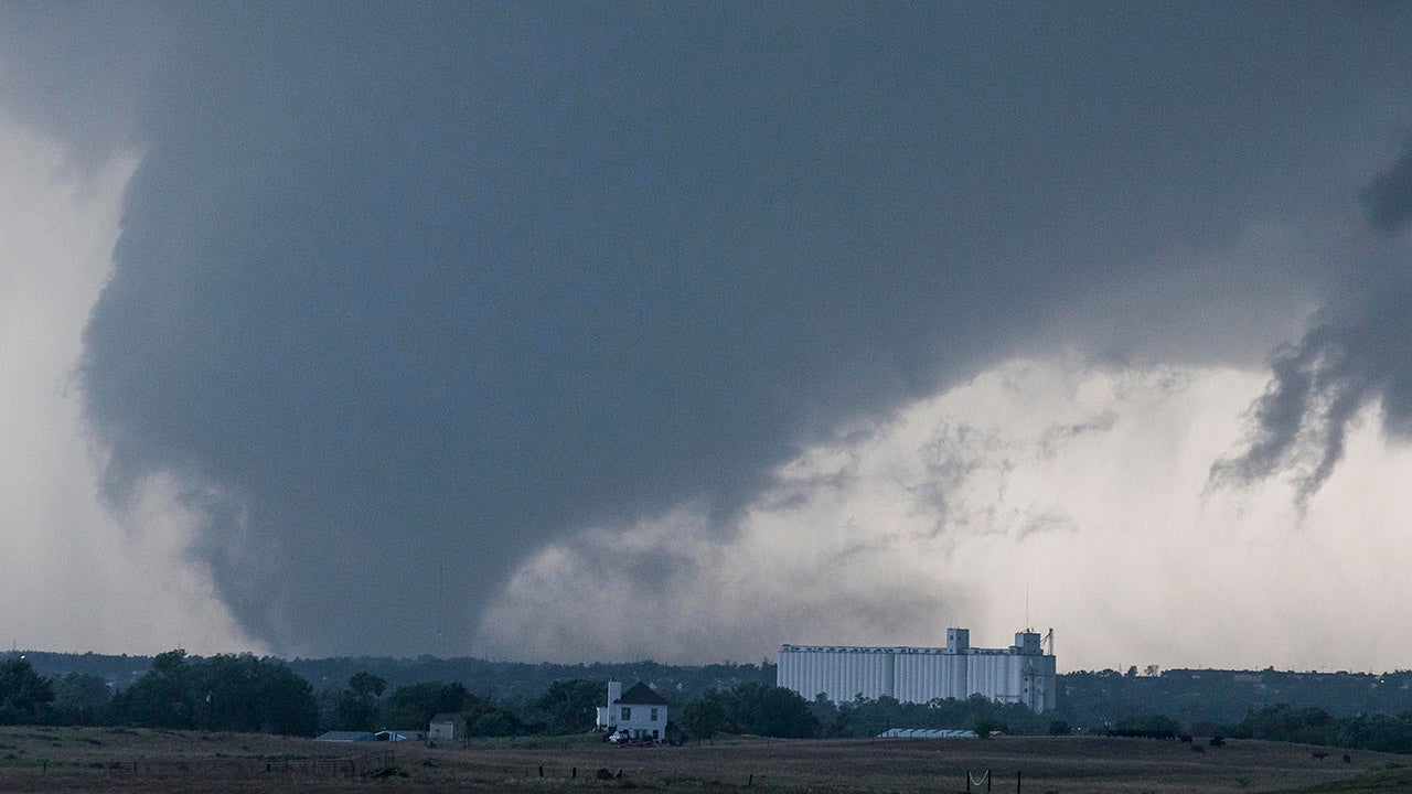 A tornado is seen South of Dodge City, Kansas, moving north on May 24, 2016. About 30 tornadoes were reported on Tuesday in five different states from Michigan to Texas. Damage to homes and property was also reported in Ford County, Kansas. (Brian Davidson/Getty Images)