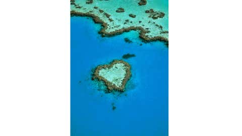 Aerial view of the Heart Reef, a heart-shaped coral reef in the Coral Sea, in the Great Barrier Reef, Whitsunday Islands off the coast of Queensland, Australia. (Emmanuel Valentin/Gamma-Rapho via Getty Images)