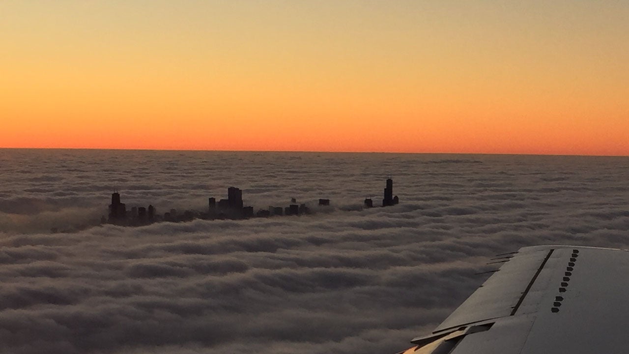 Here's a gorgeous shot of skyscrapers above the fog. Can you guess which city?