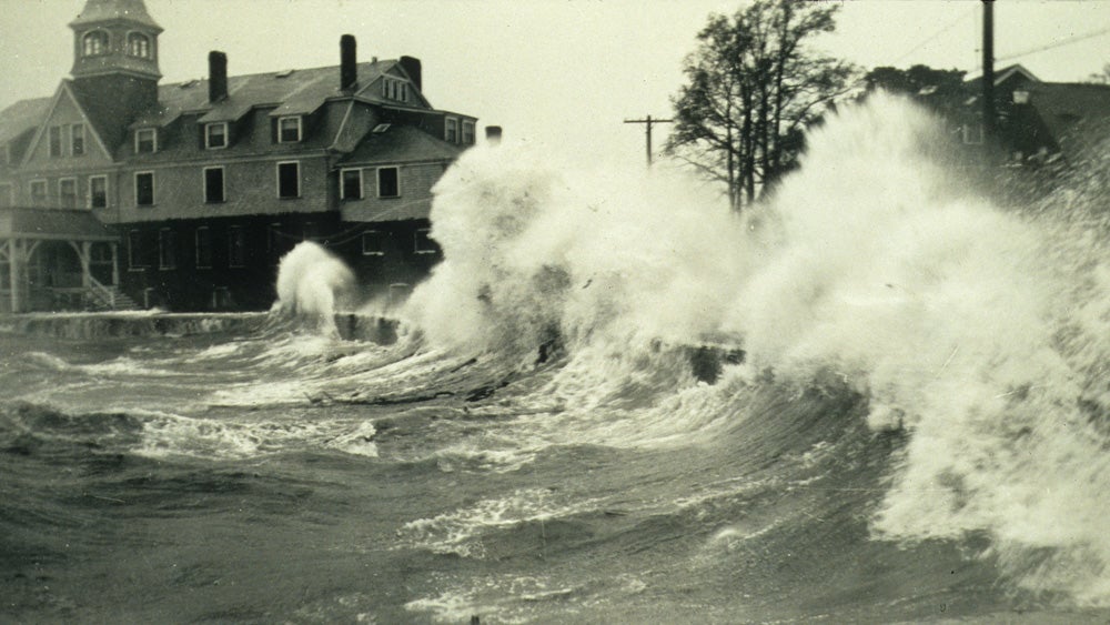 Waves crash onto shore at Woods Hole, Massachusetts during a hurricane in 1938.