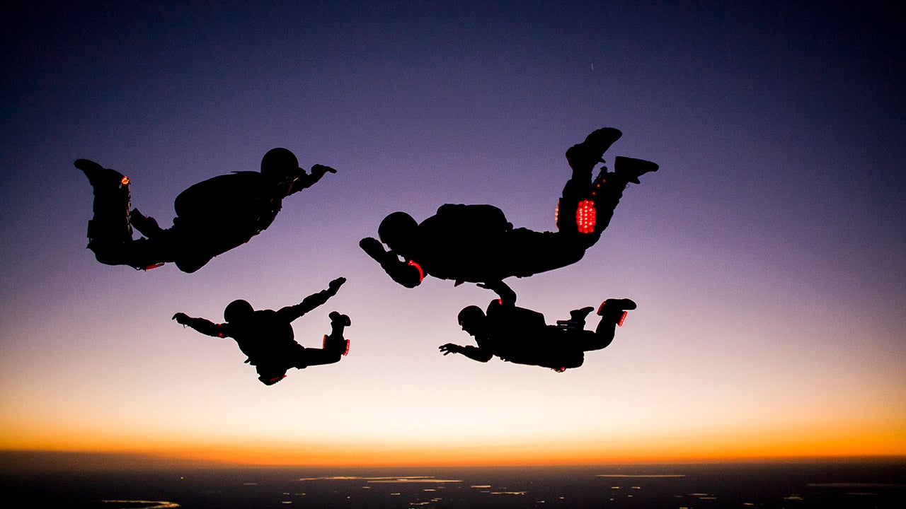 A group of crazy skydivers have taken their extreme hobby to the next level by setting off fireworks as they jump out of the plane.  (Norman Kent Photography / Fastrax / Caters News)