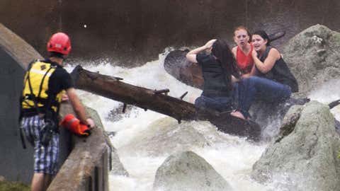 Still images from a rescue after a boat crashed over a dam and into a spillway at Lake Linganore in Maryland on Saturday night, June 27, 2015. (Frederick News Post/Sam Yu)