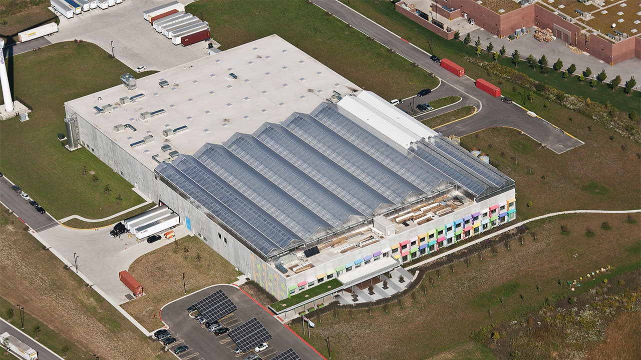 An aerial view of the Gotham Greens greenhouse in Pullman, Chicago. At 75,000 square feet it is the largest rooftop greenhouse in the world. (Gotham Greens)
