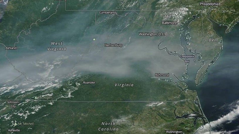 High-resolution satellite image from the NASA Terra satellite of smoke from Canadian wildfires over the Appalachians and Mid-Atlantic states on June 10, 2015. 