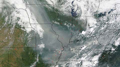 High-resolution image from NASA's Terra satellite on June 30, 2015 showing smoke plume (milky, grayish-tan) from Canadian wildfires over the Mid-Mississippi Valley, Ohio Valley, and Tennessee Valley. (Jeff Schmaltz, MODIS Rapid Response Team/NASA)