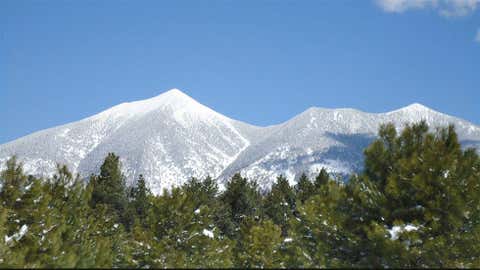 Heber Ranger Station in eastern Arizona near the Mogollon Rim measured 38 inches of snow on December 14, 1967. Image: San Francisco Peaks covered by snow near Flagstaff. From iWitness Weather contributor Andy Keller.