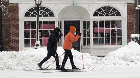 Off I-90 just to the west of Boston, the town of Natick recorded 29 inches of snow on April 1, 1997. The city of Boston was paralyzed for two days in the storm. Image: Skiers head down Charles Street in Boston on January 12, 2011 in Boston. Photo by Elsa/Getty Images