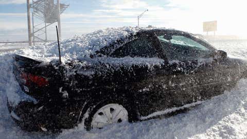 Elizabeth, located just to the south of Newark, recorded 33 inches of snow on February 14, 1899. Image: An abandoned car sits on a ramp following a major blizzard that hit the area at Newark Liberty International Airport on December 27, 2010. Photo by Jeff Zelevansky/Getty Images.