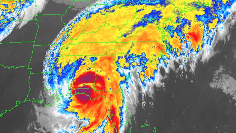 A color-enhanced satellite image from Oct. 4, 1995, showing Hurricane Opal moving into the southeastern United States.