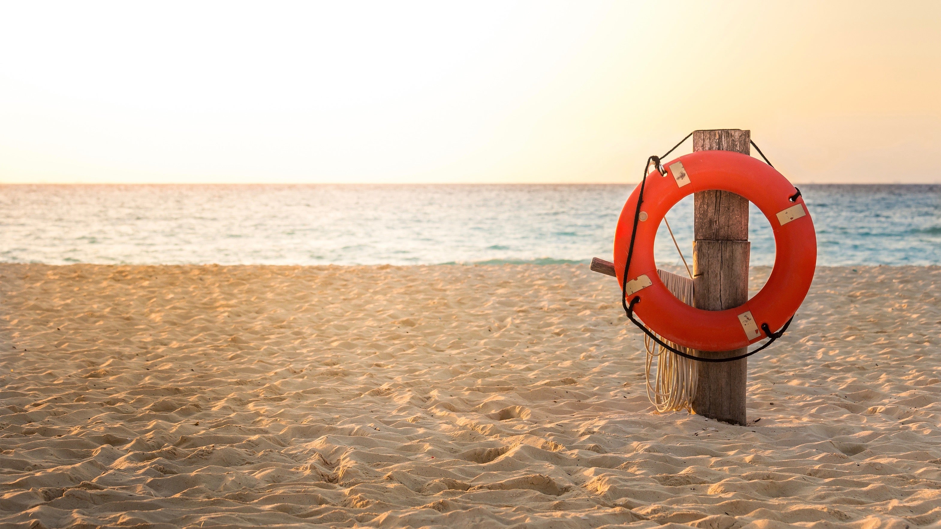 Life preserver on sandy beach somewhere in Mexico