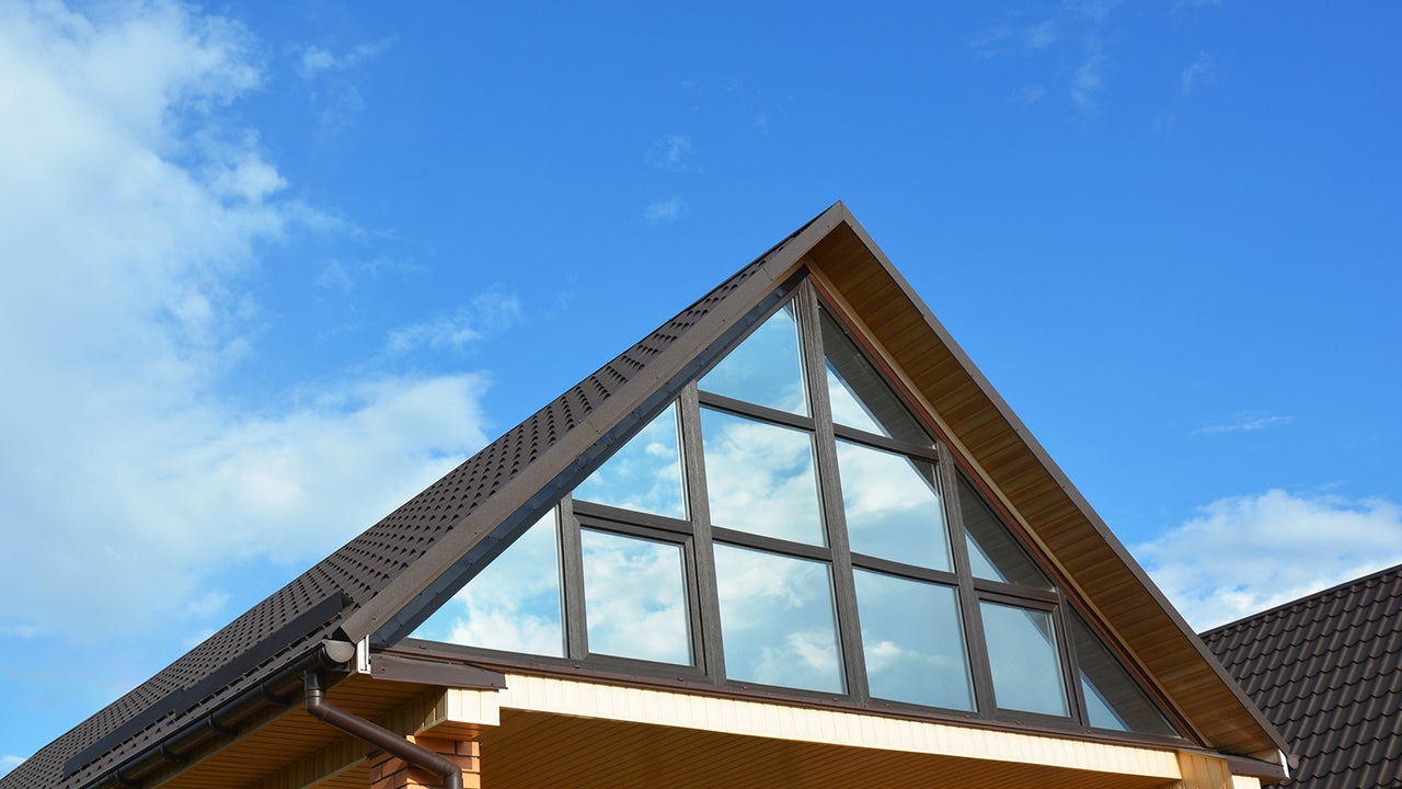 Building house attic conservatory terrace on the home roof. Conservatory or greenhouse roofing.