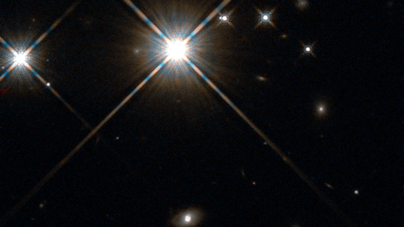 The galaxy SDSS J210415.89-062024.7 is located 2.5 billion light years away. It acted as a lens for a supernova at an even greater distance, creating four distinct images of the explosion &mdash; an effect created by strong gravitational lensing.