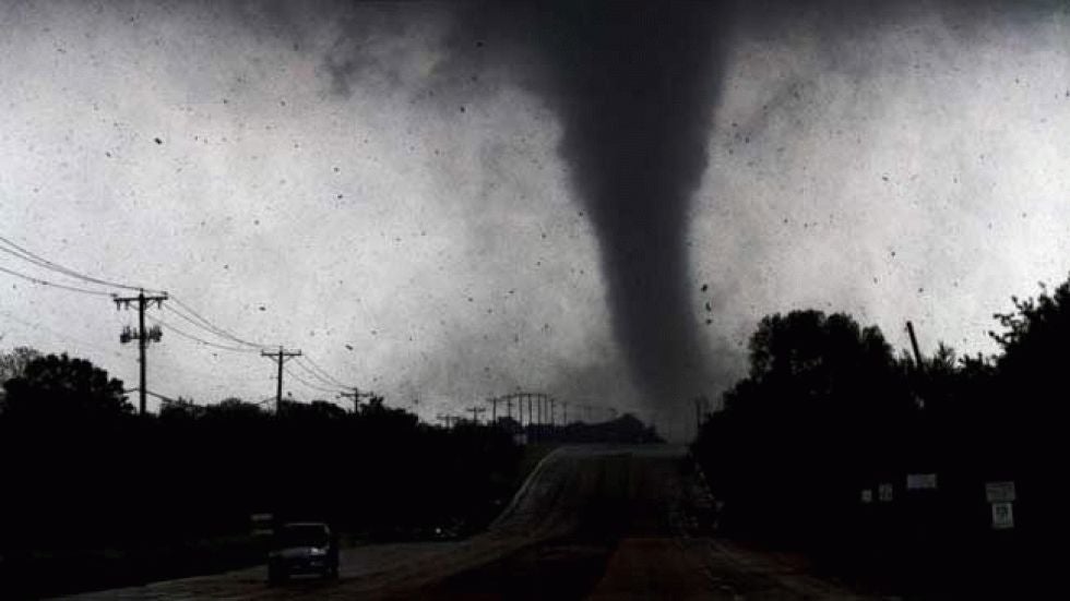 This tornado photos was taken in April, 2012 near I-20 in Lancaster, TX. This system spawned a tornado so strong that it picked up trailers and tossed them around like matchbox cars.  (iWitness weather user: ban_ss64)