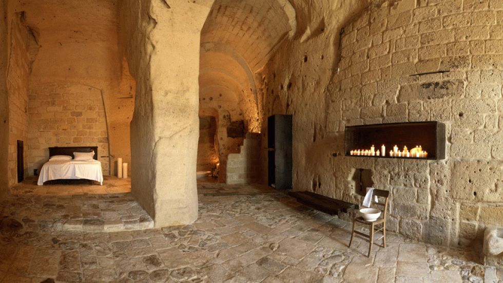 Inside one of the 'cave suites' at Sextantio Le Grotte della Civita in Matera, Italy. (Photo: Courtesy of Sextantio Le Grotte della Civita)