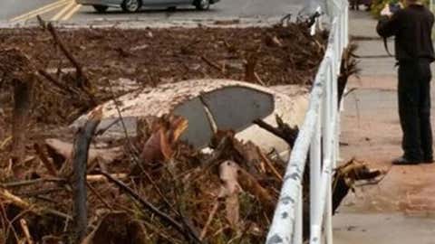 A vehicle rests in debris after a flash flood in Hildale, Utah. (Mark Lamont via AP)