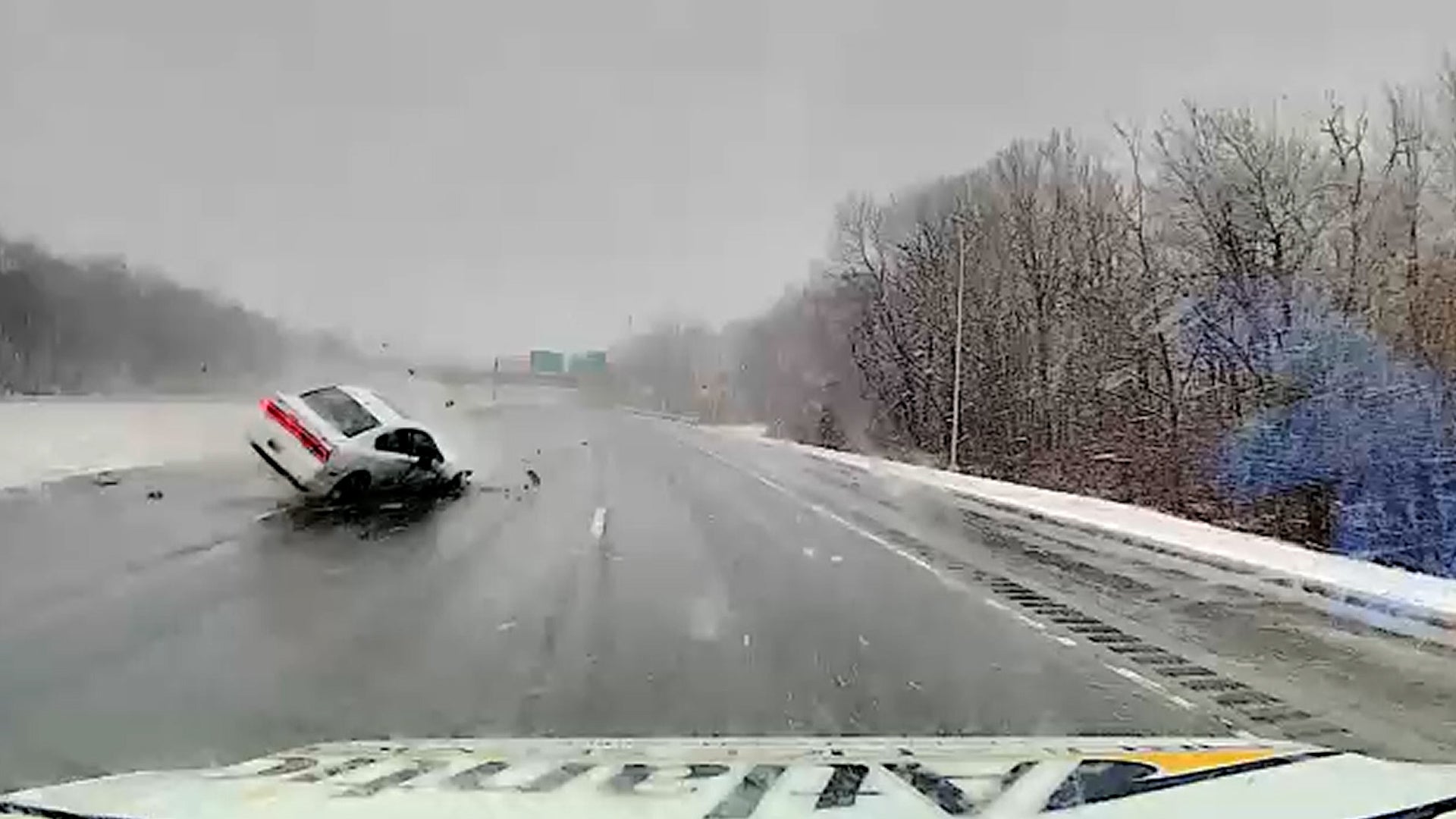 Ambulance Narrowly Misses Flipping Car On Highway 