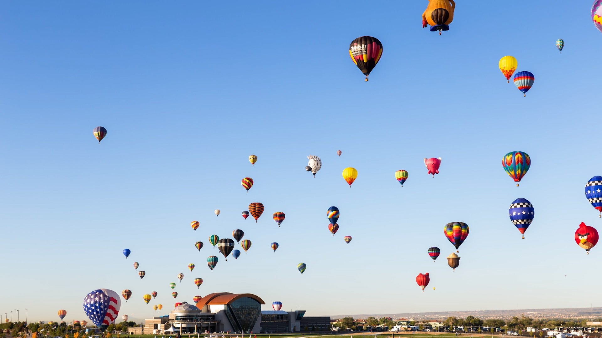Why do hundreds of hot air balloons take over Albuquerque every October?