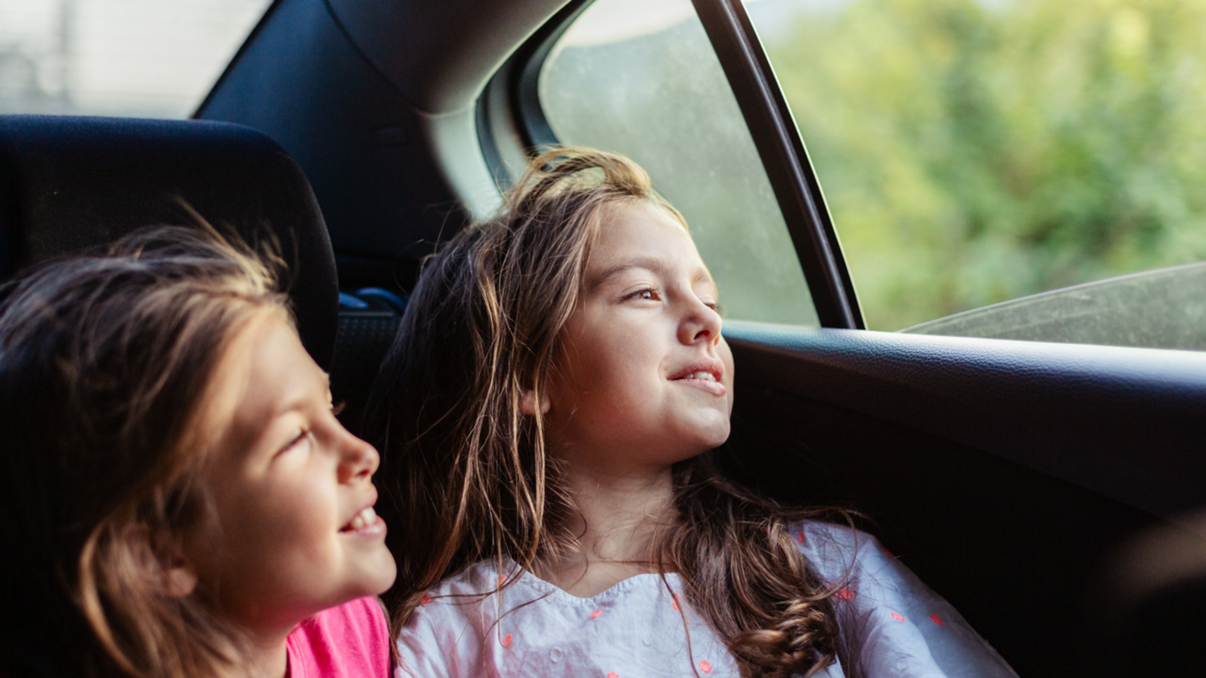 Children in backseat of car