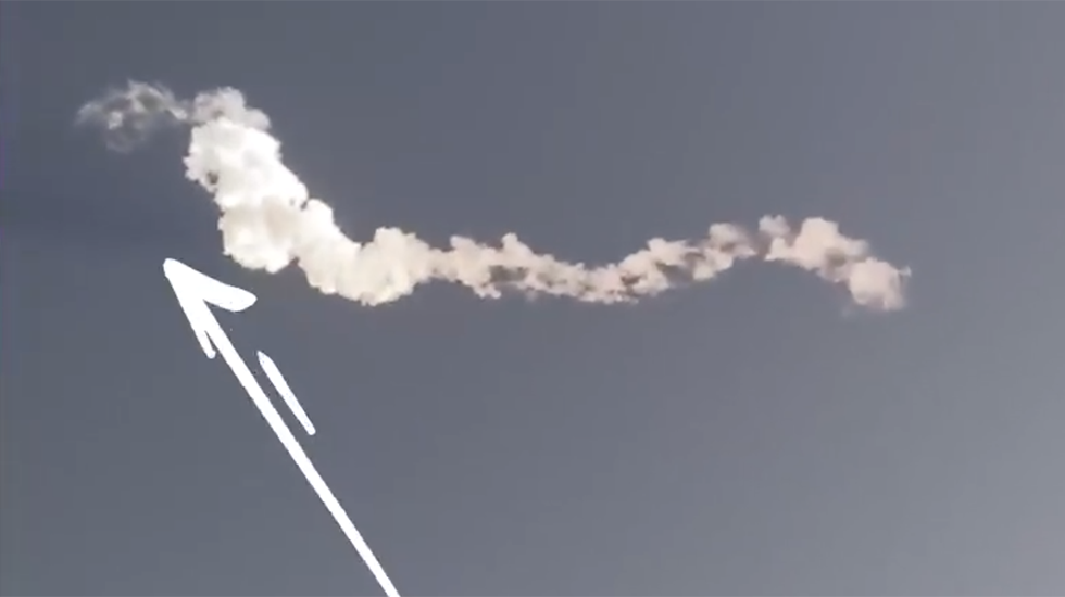 Rocket Contrail Creates Bizarre Shadow