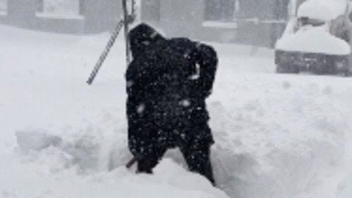 Drivers Try To Dig Out Cars Buried In Snow