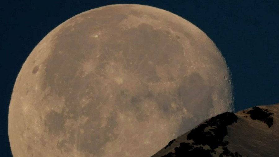 Watch a Gorgeous Moonset in Switzerland Up-Close