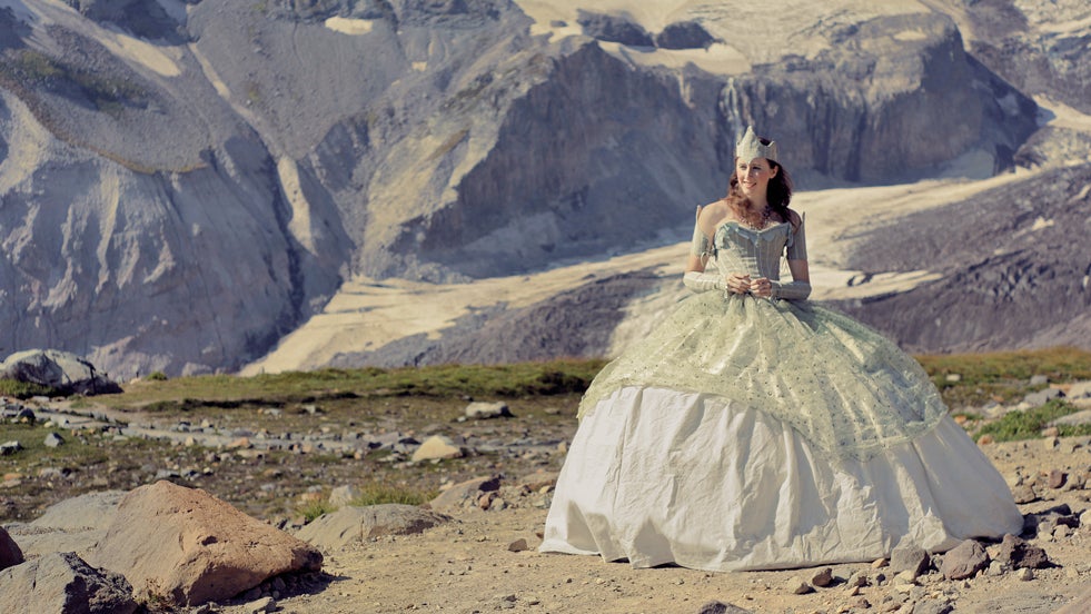 Designer Hikes Iconic Mountain Wearing Ball Gown (PHOTOS)