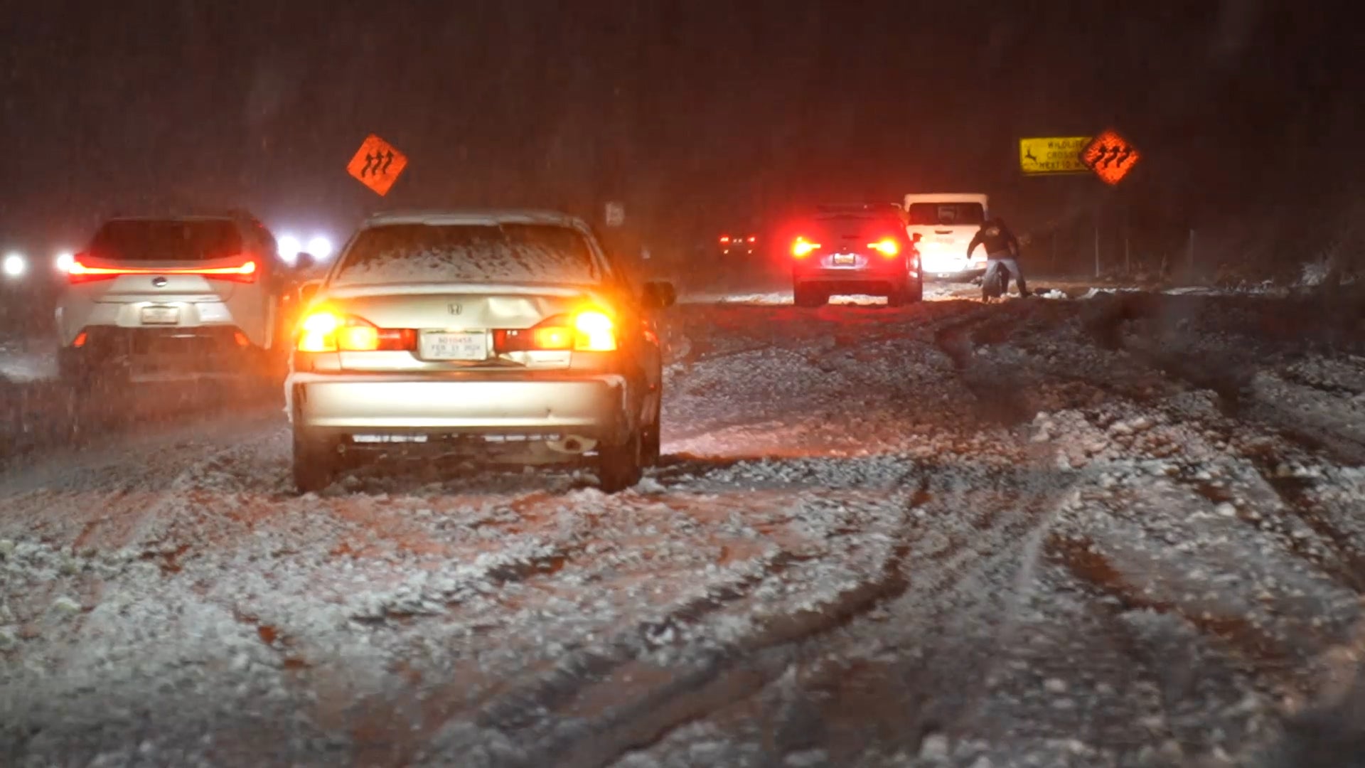 Colorado Snowstorm Creates Travel Chaos West Of Denver