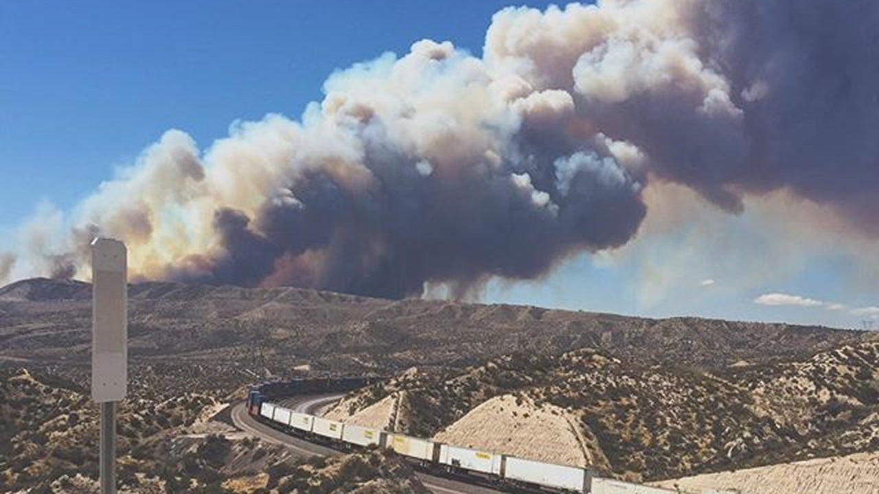 Rain Aids Firefighters Working to Douse 3,500Acre Wildfire; Highway