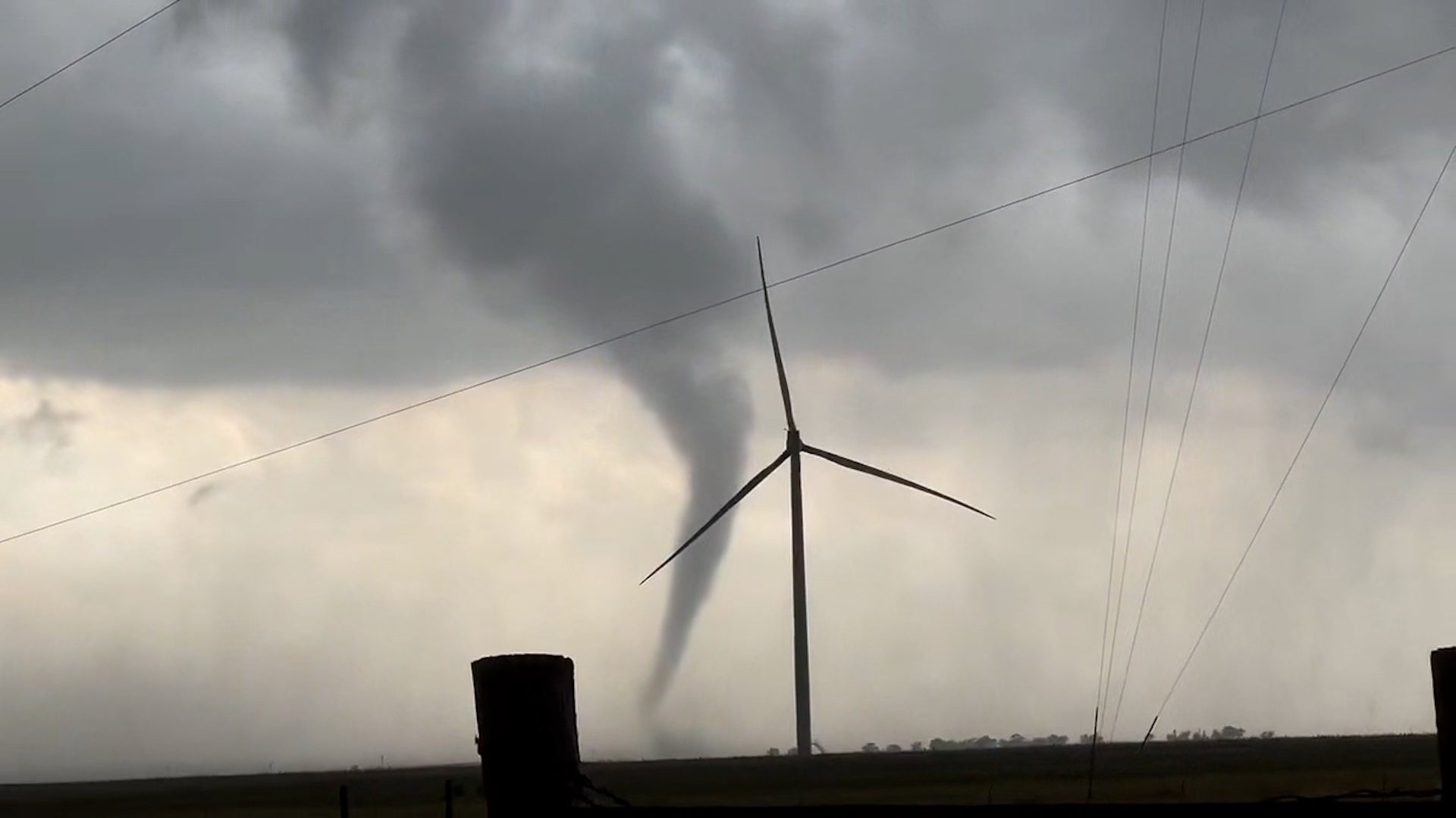 Funnel Cloud Spins Near New Mexico Wind Turbines