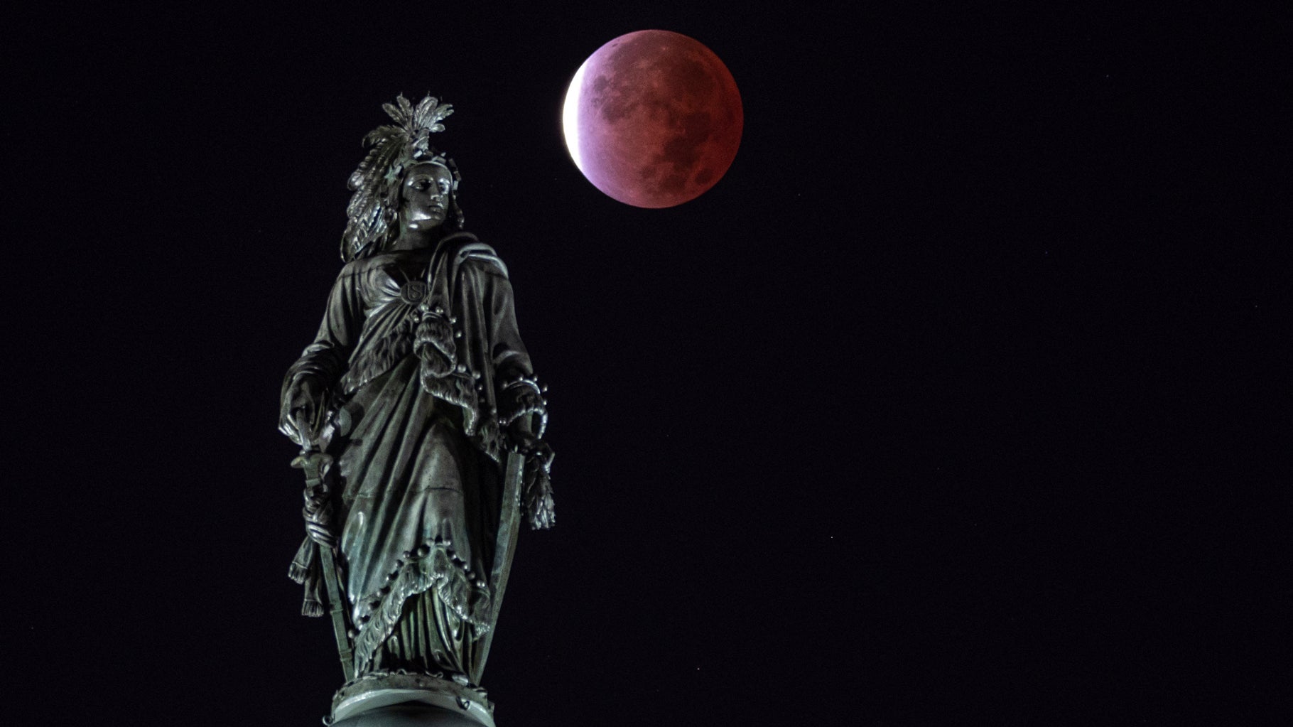 Partial Lunar Eclipse Wows Millions in United States and Elsewhere (PHOTOS)