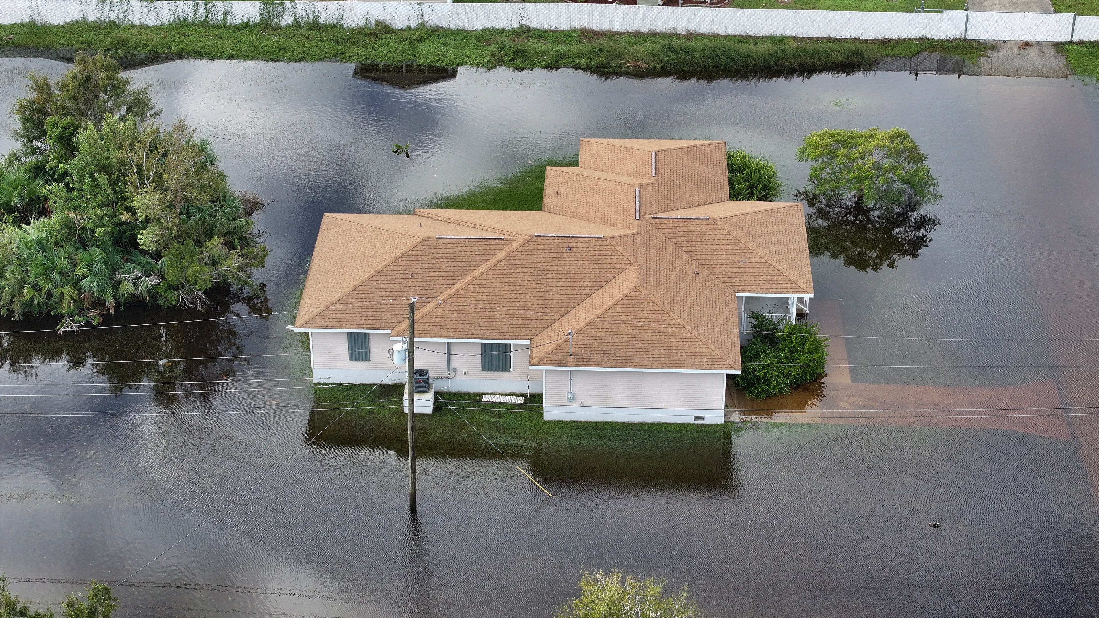 A home is surrounded by water.