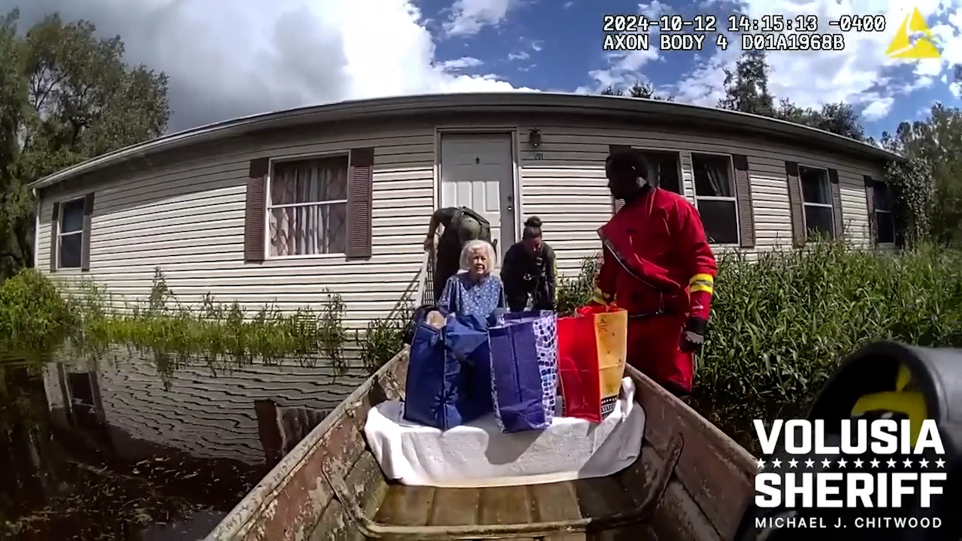 Deputies Slog Through Floods To Rescue Woman And Cats