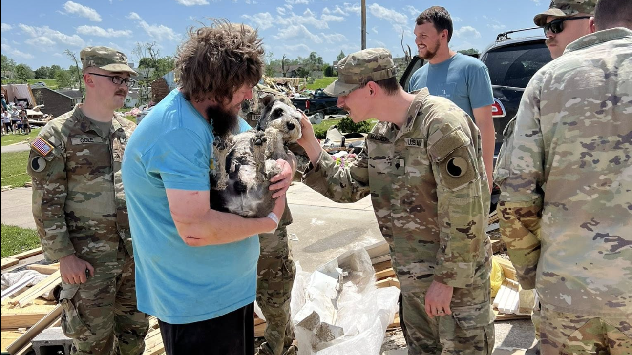 'You Know It And I Know It': Guardsman Crawls Through Debris To Save Tornado-Tossed Pup