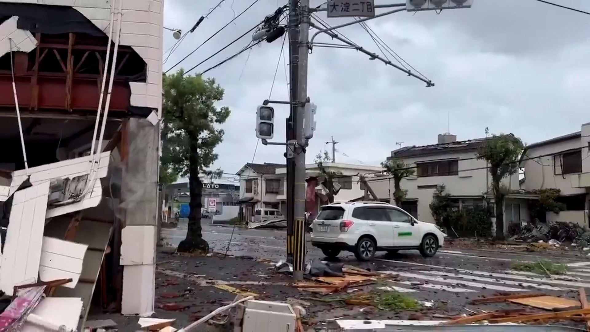 Suspected Tornado Damages Homes Ahead Of Japan Typhoon