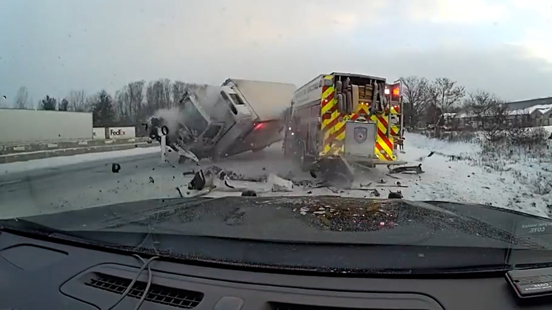 Truck Plows Into Emergency Vehicles On Slick Michigan Road