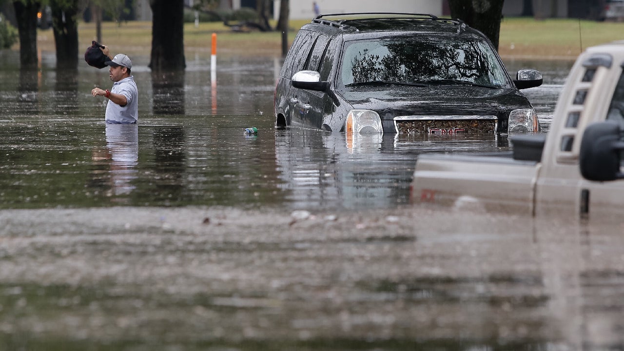 Houston Swamped by Flooding; Cars Stranded, Dozens of Water Rescues