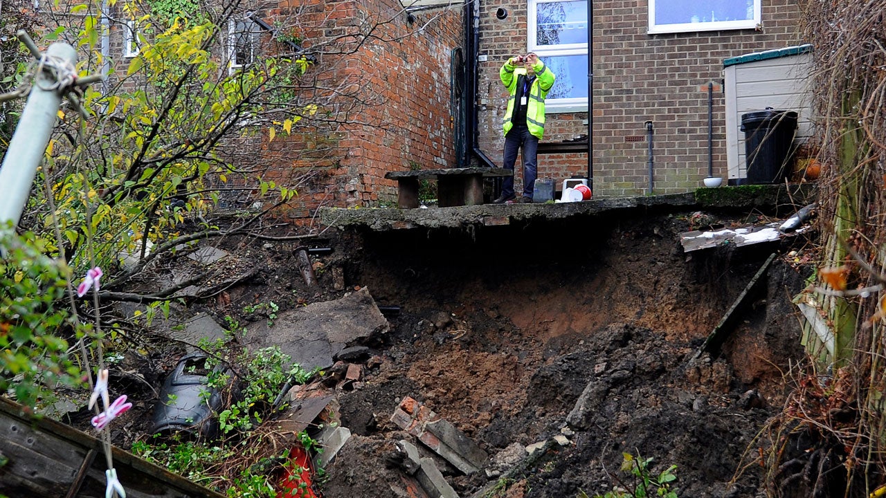 Massive Sinkhole Swallows U.K. Residents' Backyards, Leaves Several
