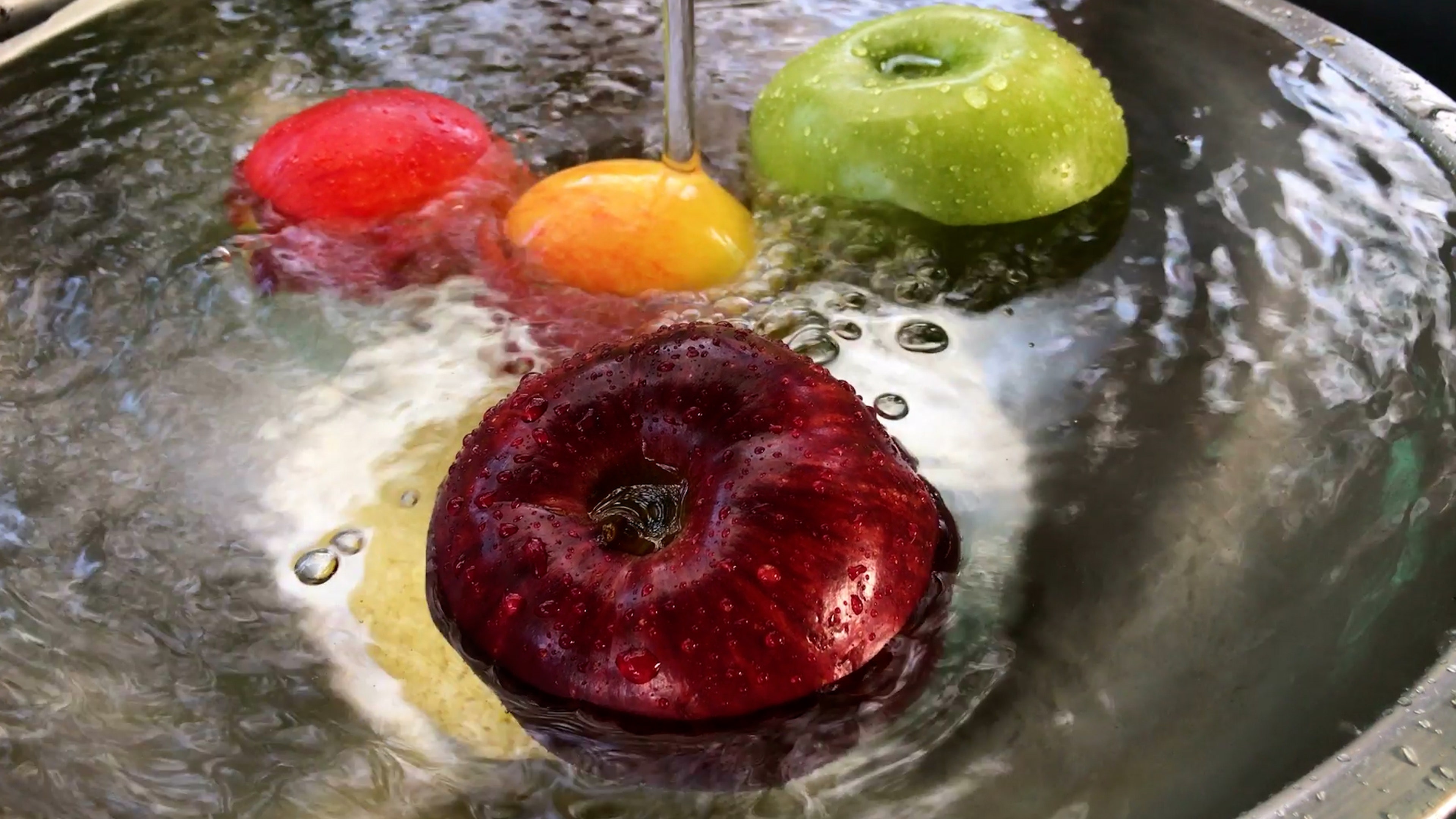 Before You Take A Bite: Washing Your Apple May Not Be Enough