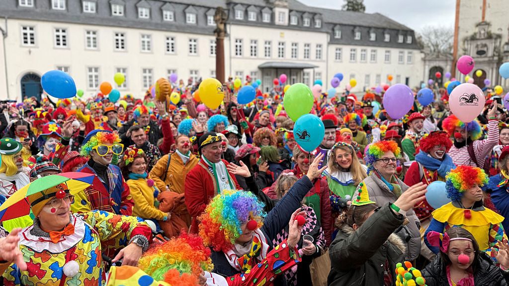 Hundreds Of Clowns Gather At German Parade Despite Rain