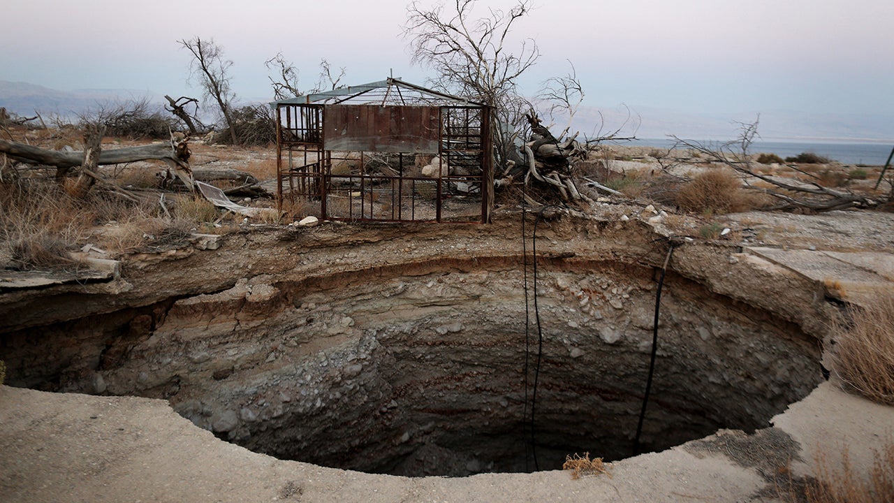 Abandoned Tourist Resorts Swallowed by Sinkholes Caused by Shrinking Dead Sea (PHOTOS)