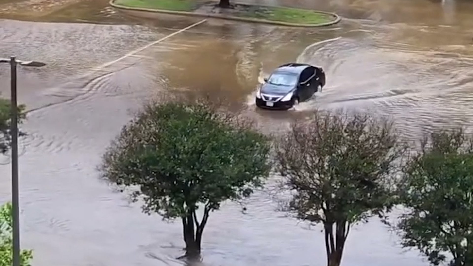 Driver Takes On Texas Flood And Loses