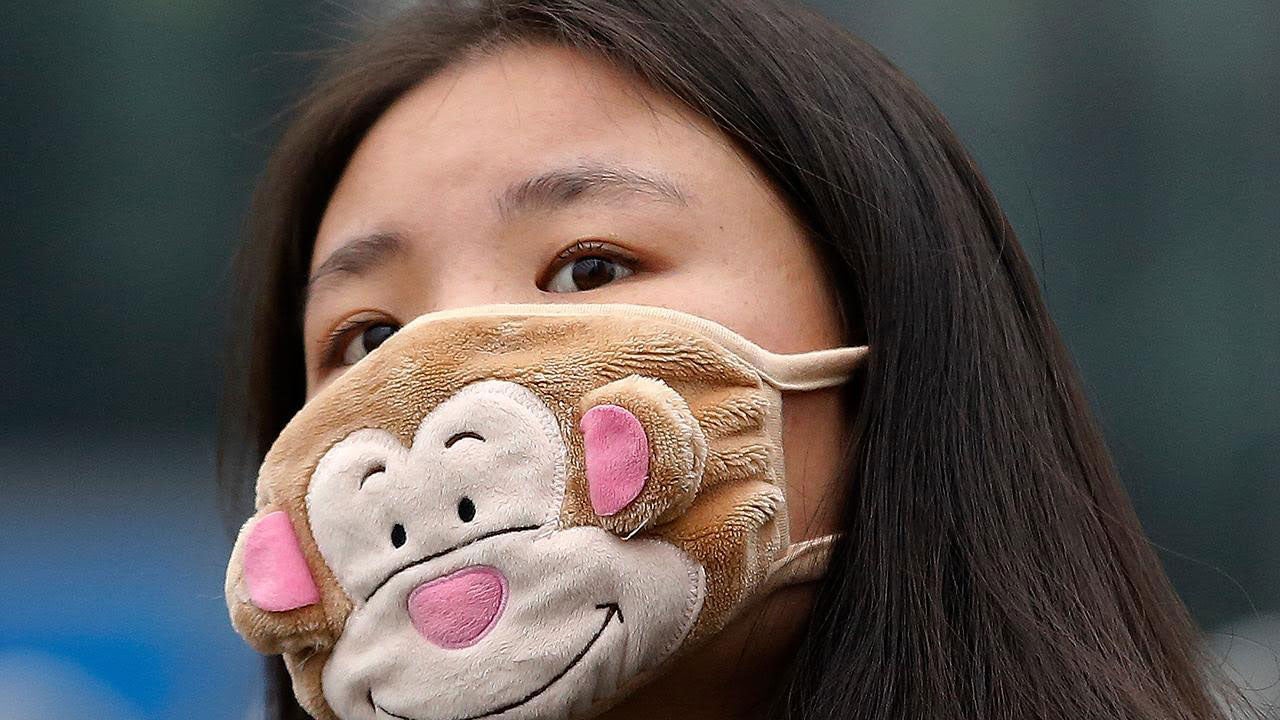 Protecting Their Health: Wearing Fashionable Face Masks in China