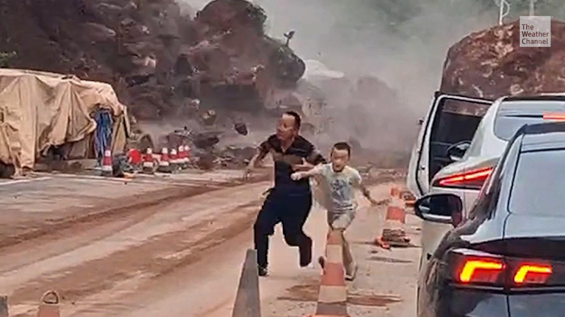 Dad And Son Bolt As Boulders Crash Down In China Landslide