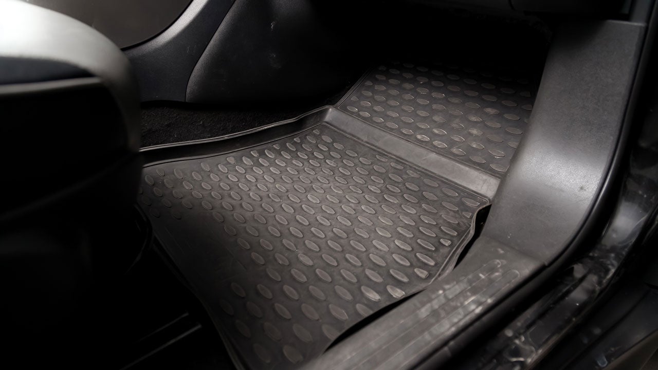 Car with floor liners