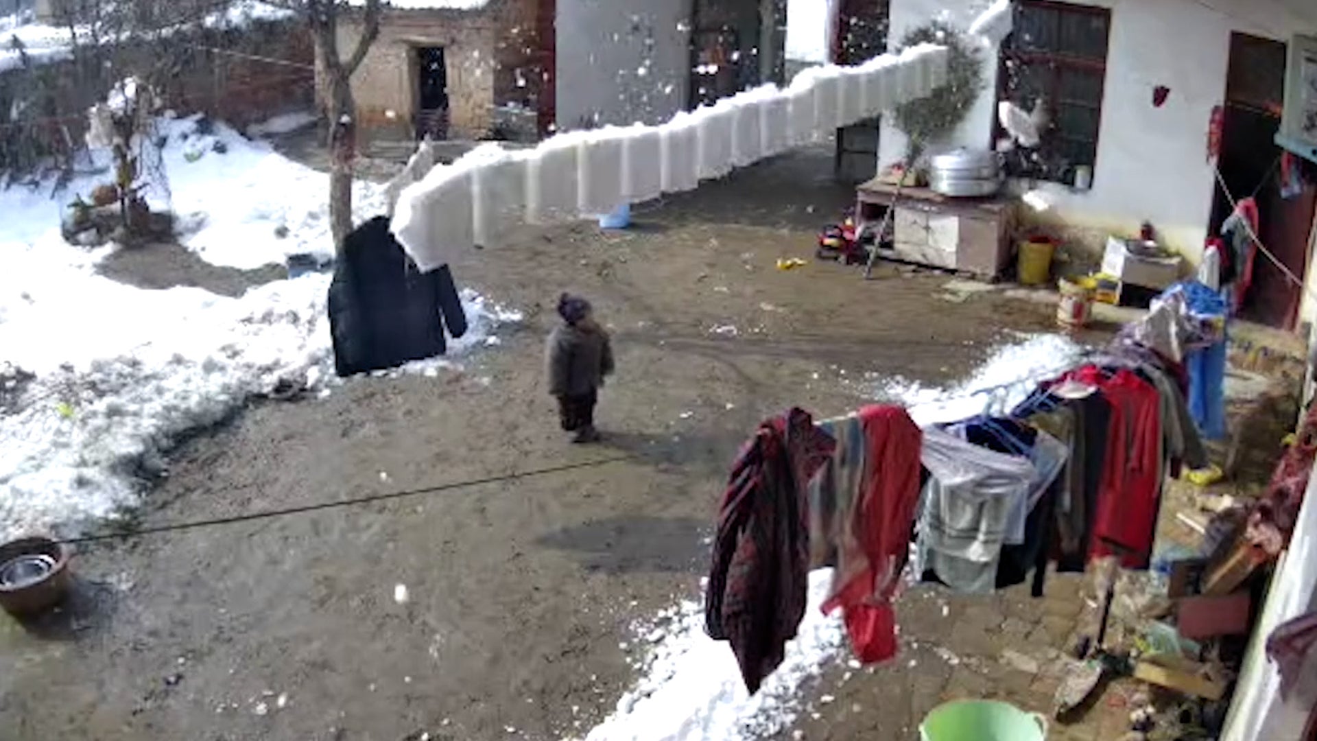 Child Escapes Roof Avalanche In Heart-Stopping Video