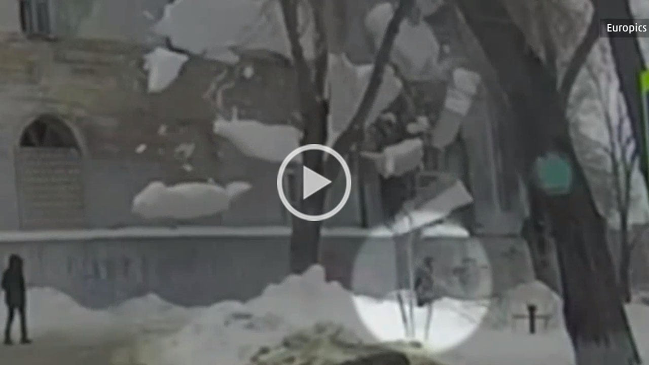 Watch Falling Ice Bury Pedestrian in Russia The Weather Channel
